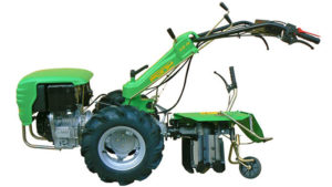 motocoltivatore equipaggiato con aratro rotativo voltaorecchio | Casorzo Macchine Agricole srl